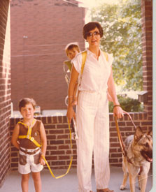 This is me with Leslie on my back, Joel on a leash, and my first guide dog, Marit
